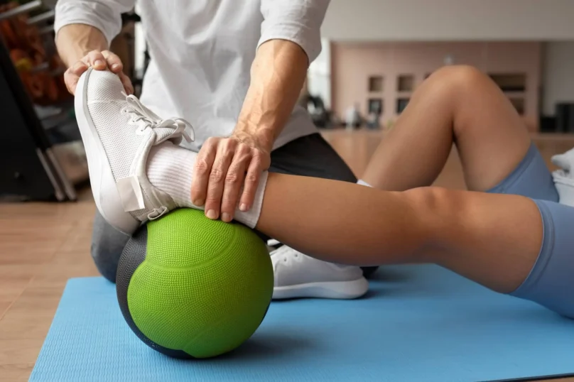 resize_patient-doing-physical-rehabilitation-helped-by-therapists-1-1